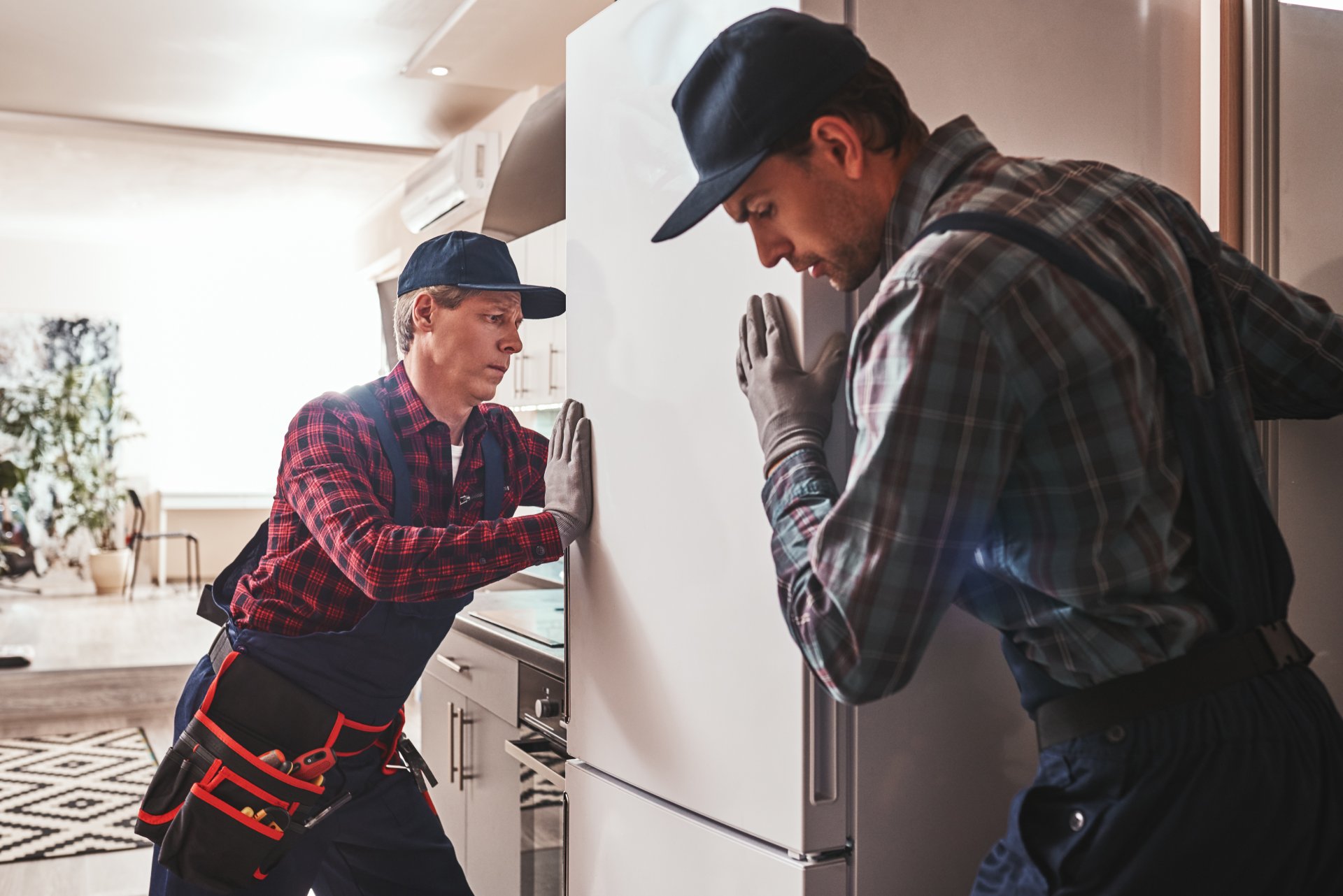 Person checking off items on a seasonal appliance maintenance checklist
